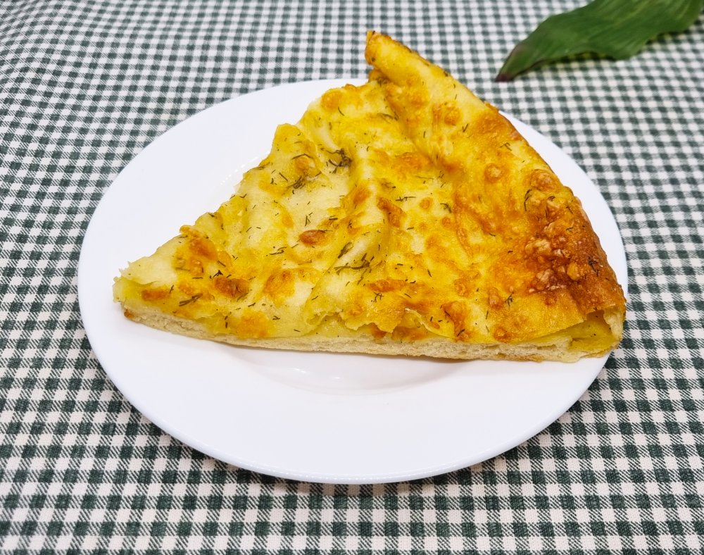 Пицца "Картофельно-чесночная" кусок